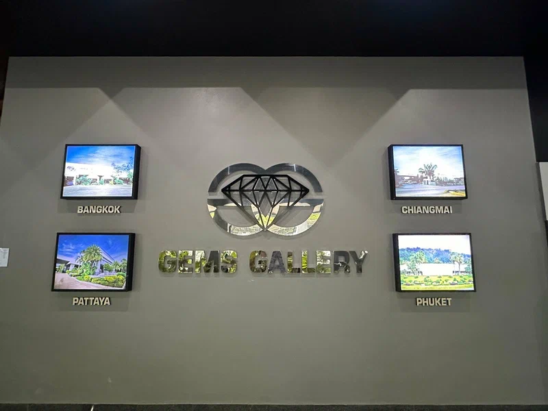 Gems Gallery brand wall featuring four city flagships: Bangkok, Chiang Mai, Pattaya, and Phuket