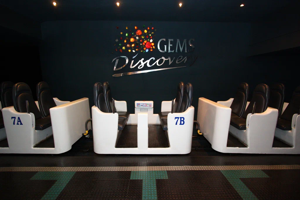Gems Discovery train cars with leather seats waiting at the boarding platform